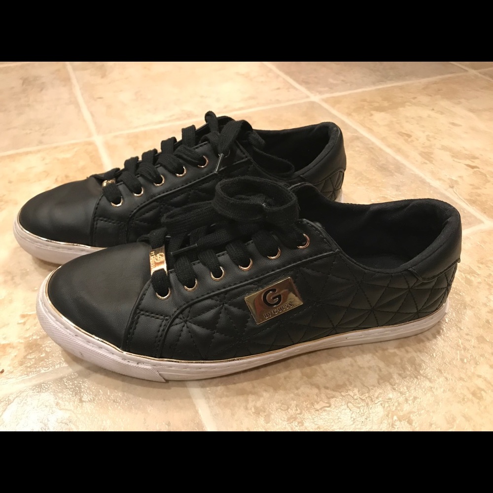 Guess black and gold shoe